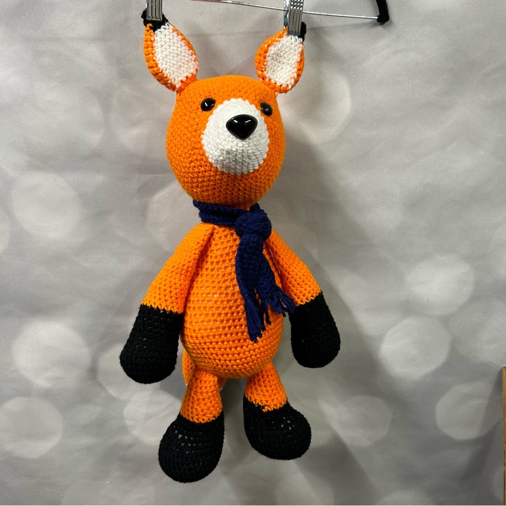 Crocheted amigurumi Frederick the fox with‎ scarf
